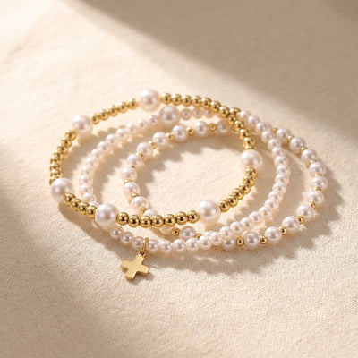 The Grace Stack: Pearl, Cross and Tube Bracelets photo 1