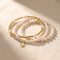 The Grace Stack: Pearl, Cross and Tube Bracelets