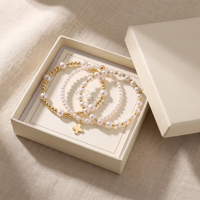 The Grace Stack: Pearl, Cross and Tube Bracelets photo 3