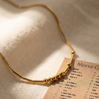 The Coded Pair, Morse Code Necklace